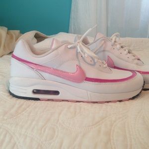 White and pink Nike sneakers