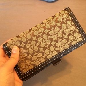 Coach check book cover