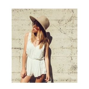 White romper size small. NWOT