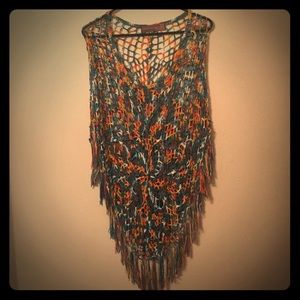 Colorful crocheted fringe poncho