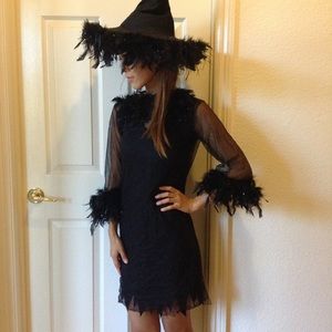 Black feathery witch Halloween costume with a hat