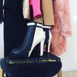 Gold, white & black high heel boots.