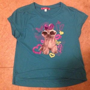 A blue puppy dog shirt with bow