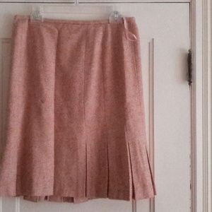 Coral pleated knee length wool skirt