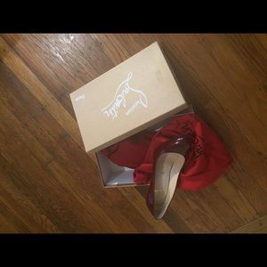 Christian Louboutin burgundy patent leather pumps!