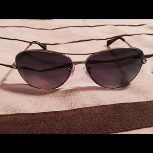 Re poshed Coach Aviators sunglasses.