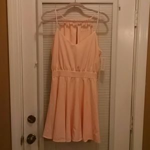 Peach short dress with beautiful open back