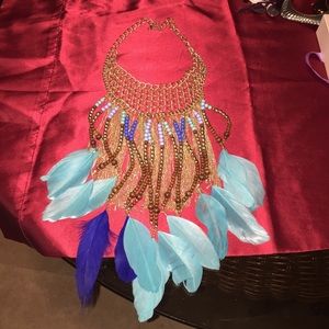 Beautiful gold feather necklace