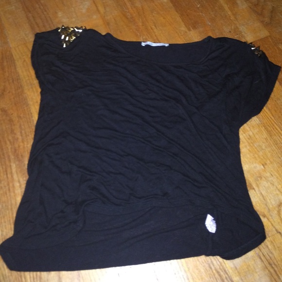 Slightly high- low cropped, black studded shirt