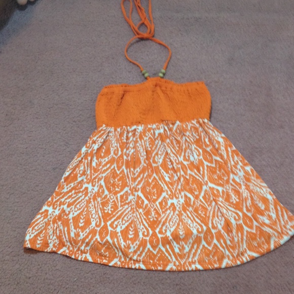 orange haulter top