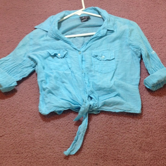 blue long sleeved collard button up shirt