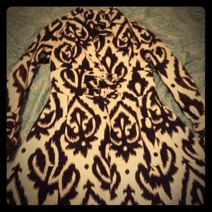 Black and white trenchcoat with victorian pattern