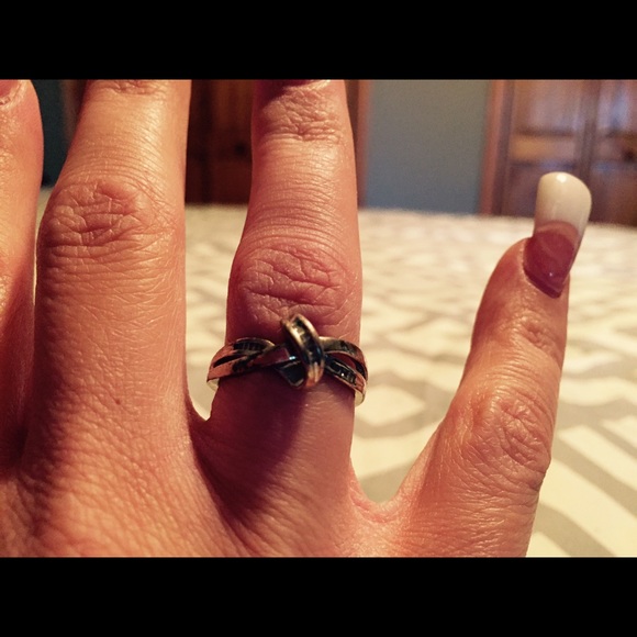 Sterling silver and diamond knot style ring