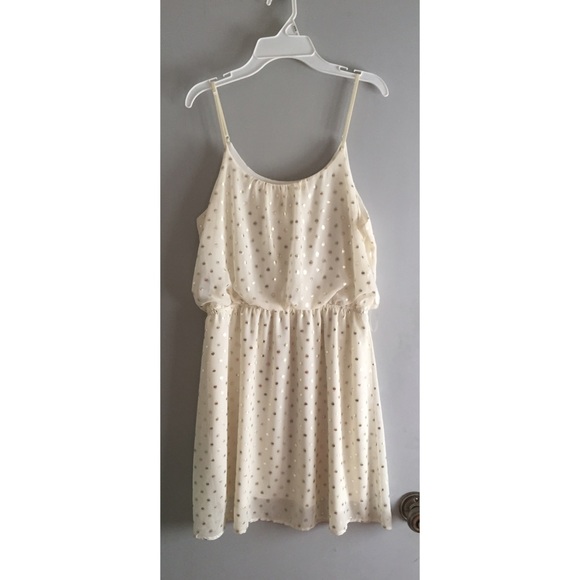 white dress with gold polka dots