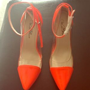 Bright orange 4 1/2 inch heel, size 8.5. NWOB!