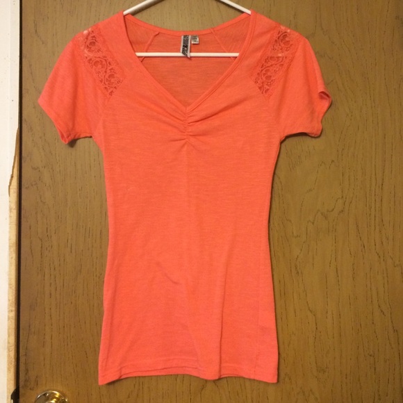 Cute orange top.