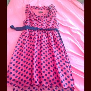 Pink and navy blue polka dot Zunie dress.