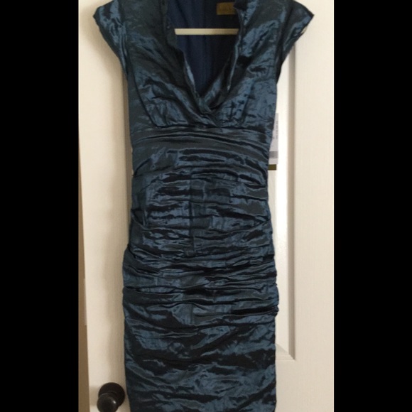 Teal dress, New with tags. Knee length.