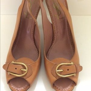 Yves Saint Laurent sling back with kitten heel.