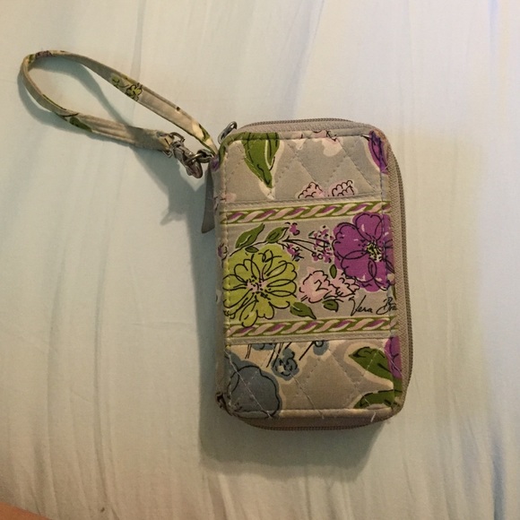 Vera Bradley wristlet. Fits phones in pocket.