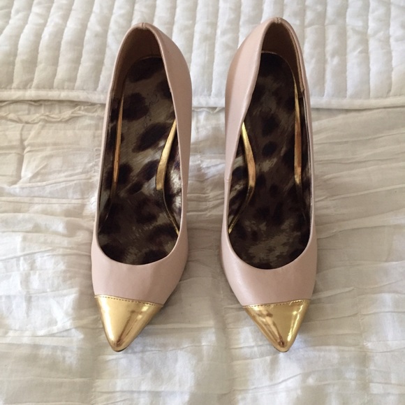 Pink and gold cap toe pumps