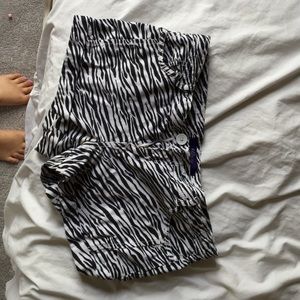 White and black zebra print shorts