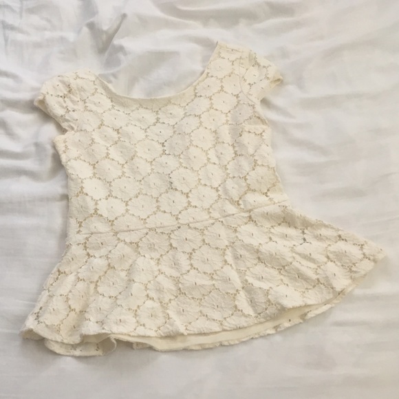 Cream colored lace peplum top
