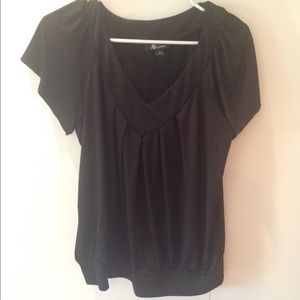 Black v neck top with a banded bottom !