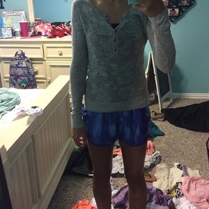 Light grey lace long-sleeve shirt.