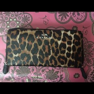 COACH ocelot print zip wallet