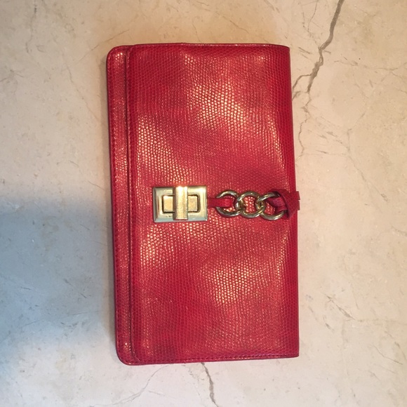 Red clutch with gold closure