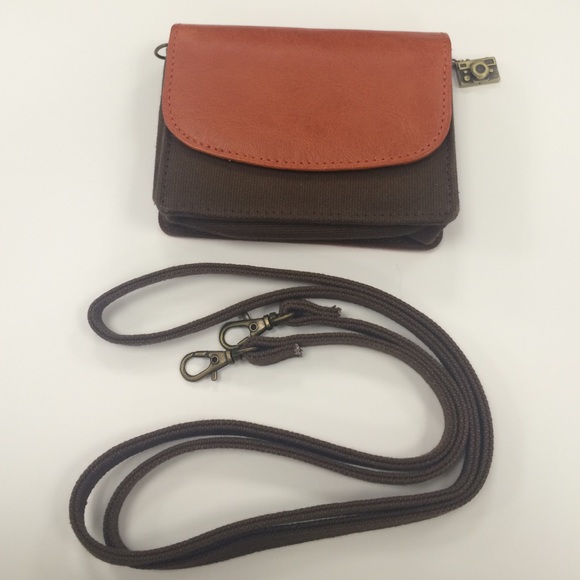 Small Camera purse/case with strap included.