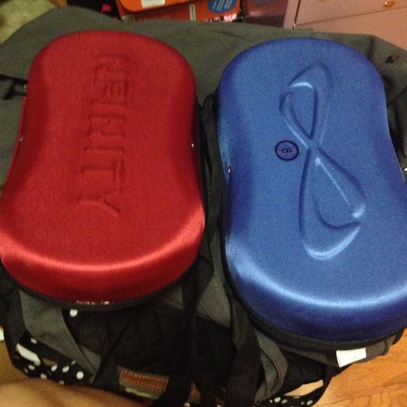 Two nfinity shoe boxes and cheer medals