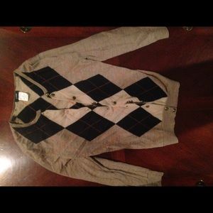 Camel and navy argyle sweater with orange detail