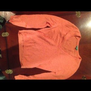 Bright orange wool sweater