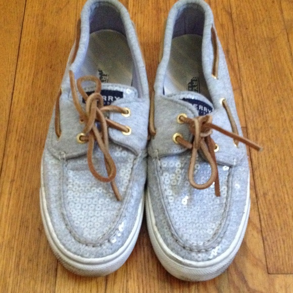 Gray cloth with clear sequins and leather strings