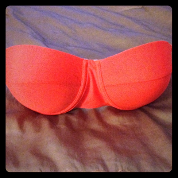 Bright orange bathing suit top!