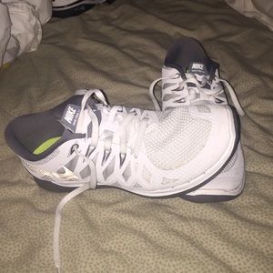 Women's Nike Free 5.0 running shoes.