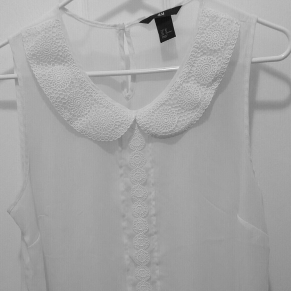 White sleeveless blouse