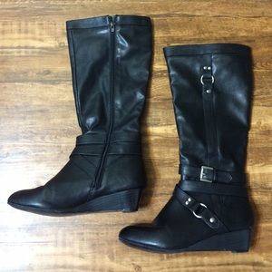 Tall black wedge boots