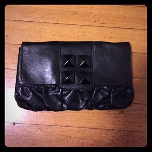 Black studded clutch