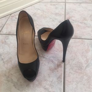 Christian Louboutin black leather heels