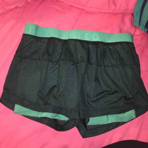 Green Nike shorts built in spandex
