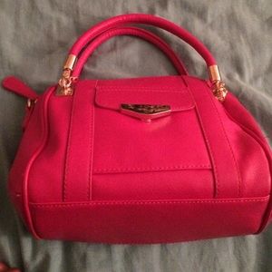 Small hot pink hand bag