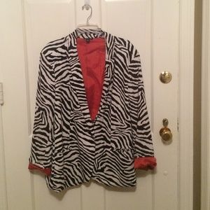 Leopard polyester / spandex  lined jacket.
