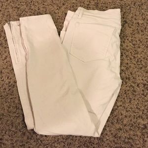 White corduroy ankle zip pants