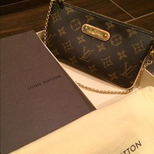 💯% Authentic Louis Vuitton Clutch