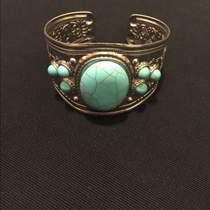 Silver cuff with turquoise stones