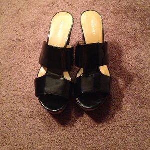 Black and cheetah print wedges