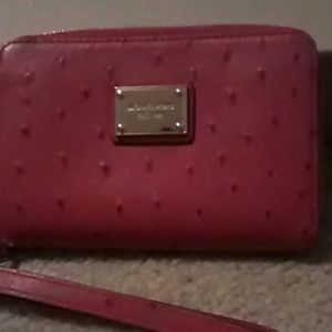 Red Michael Kors wristlet